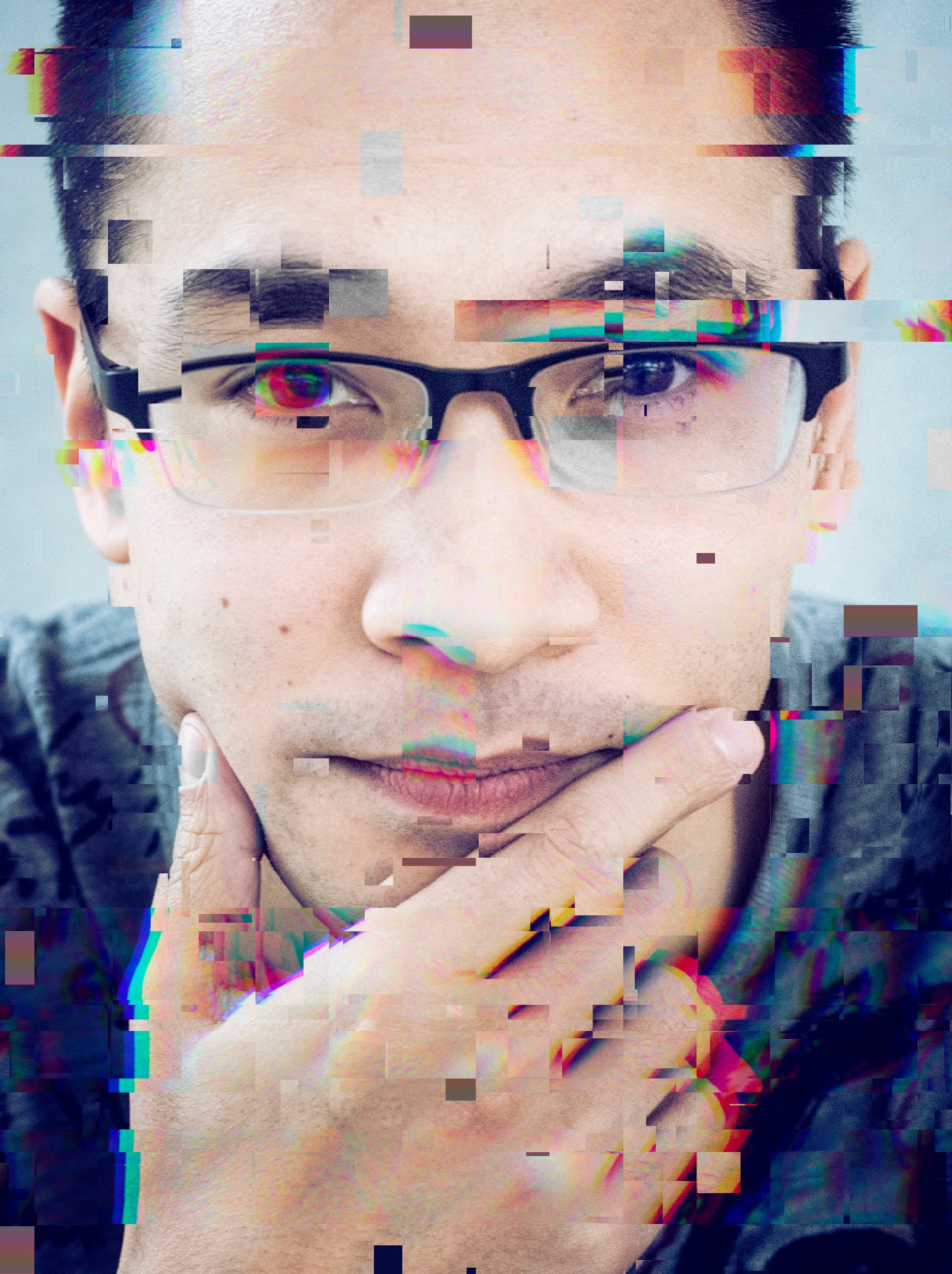 Olaf Witkowski resting his chin on his hand, in a portrait with a digital glitch effect