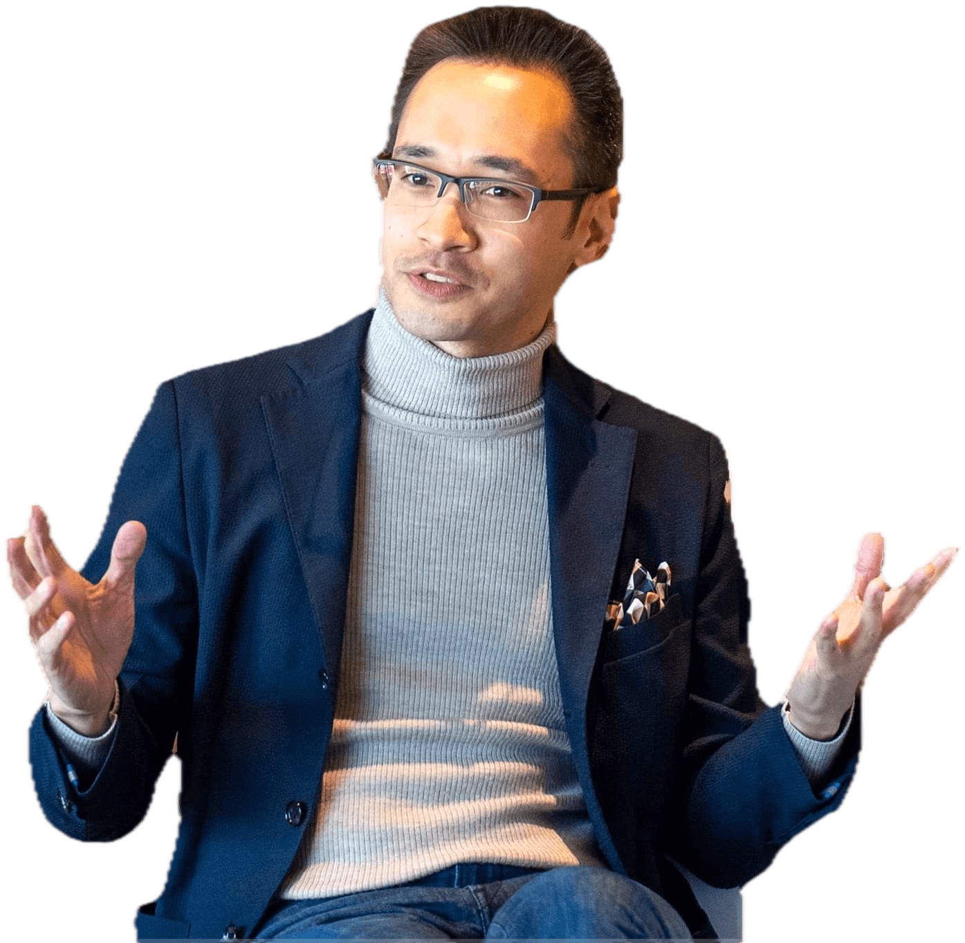 Dr. Olaf Witkowski in conversation, mid-gesture