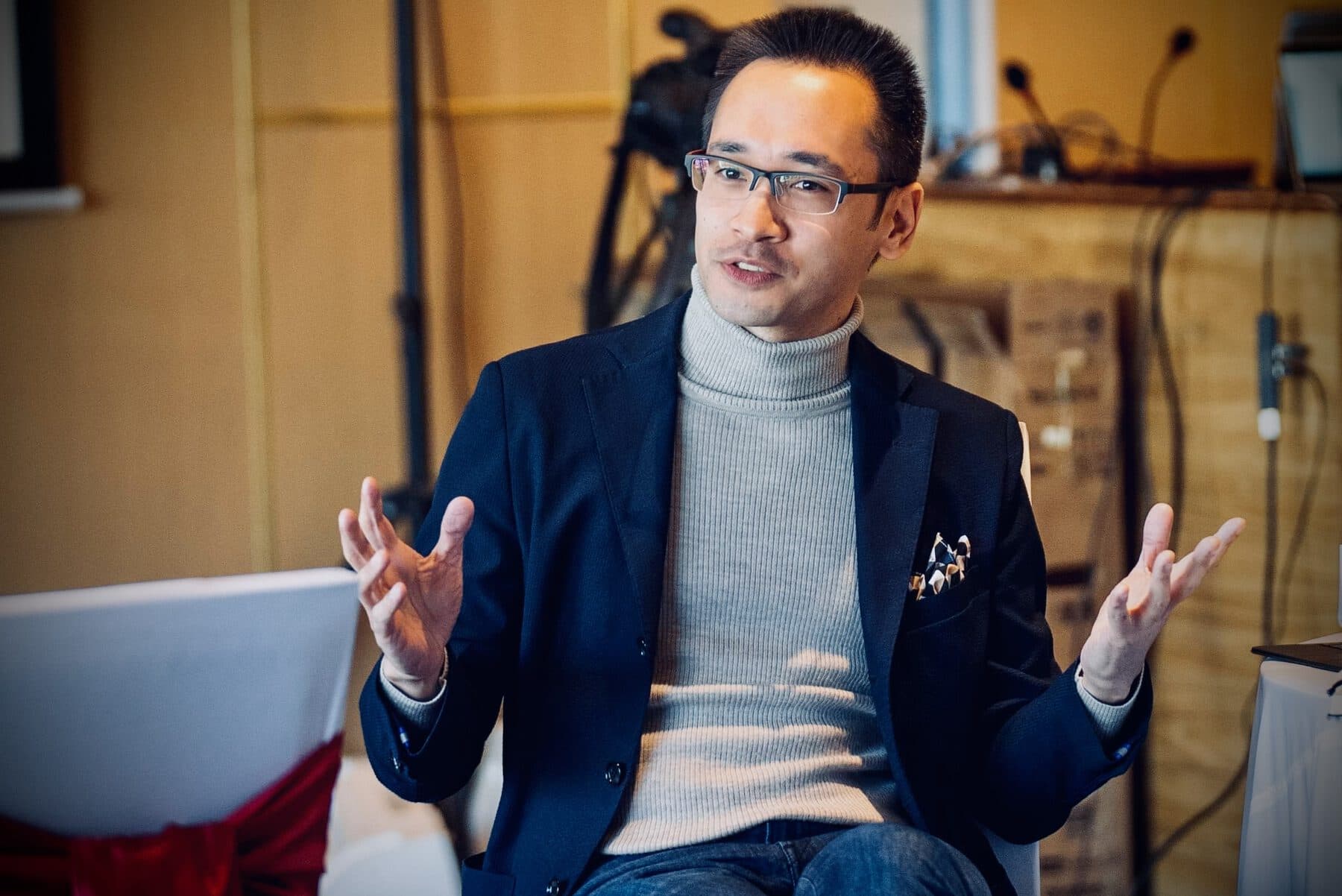 Dr. Olaf Witkowski in conversation at a research institute setting